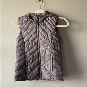 Gray vest.